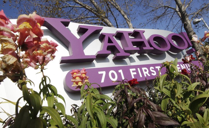 In this Jan. 4, 2012 photo, the Yahoo company logo is displayed at their headquarters in Sunnyvale, Calif. Yahoo Inc., reports quarterly financial earnings Tuesday, Jan. 24, 2012, after the market close.