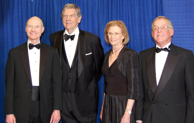 Walter Hussman, Jr., Wayne Cranford, Melba Shewmaker, who is representing her husband Jack Shewmaker, and John Ed Anthony stand together before their induction into the Arkansas Business Hall of Fame on Friday night at the Statehouse Convention Center in Little Rock. 