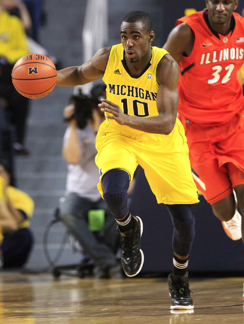 Sophomore guard Tim Hardaway Jr. scored 15 points to lead No. 22 Michigan to a 70-61 victory over Illinois on Sunday in Ann Arbor, Mich. 