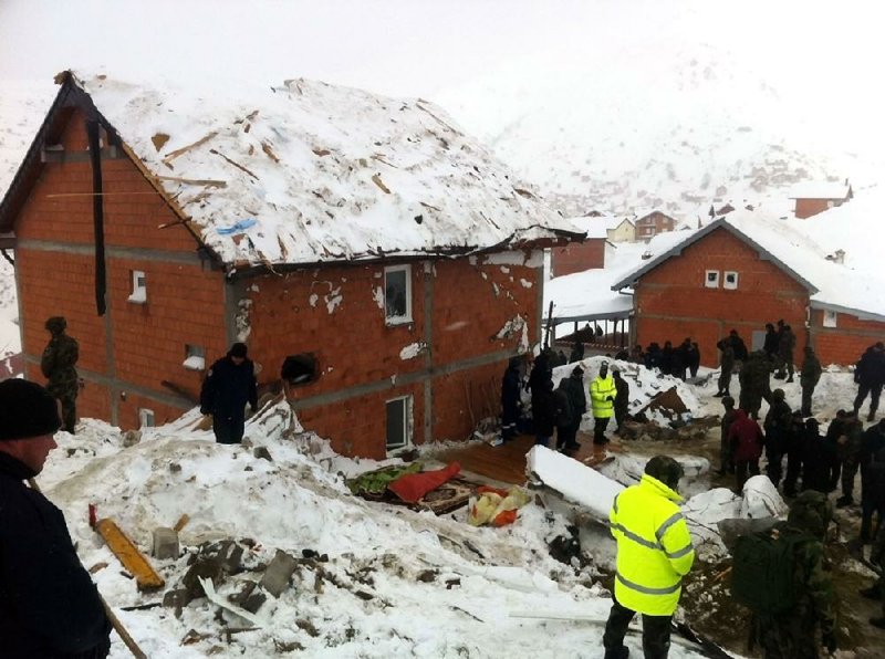 Avalanche buries villagers; girl found alive. Bodies of two victims are placed near a house and covered with blankets Sunday after an avalanche hit houses in the village of Restelica, southern Kosovo. A 5-year-old girl was found alive after her home was buried under 33 feet of snow.