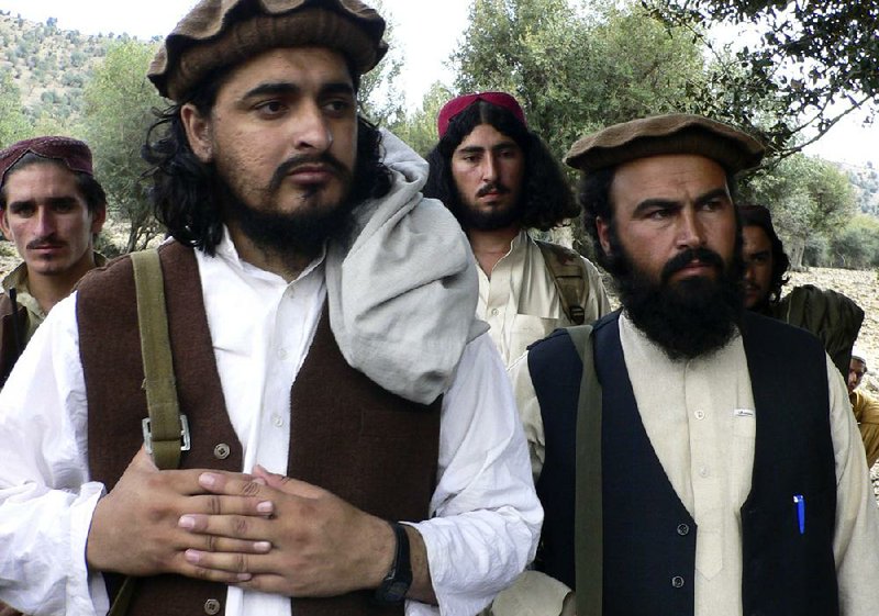 Pakistani Taliban chief Hakimullah Mehsud (left) is seen with his comrade Waliur Rehman in this 2009 photo. 