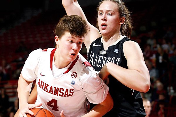 Sarah Watkins (shown playing against Vanderbilt freshman Clair Watkins) and Ashley Daniels knocked down the shots when it counted most Sunday at Auburn, Arena.