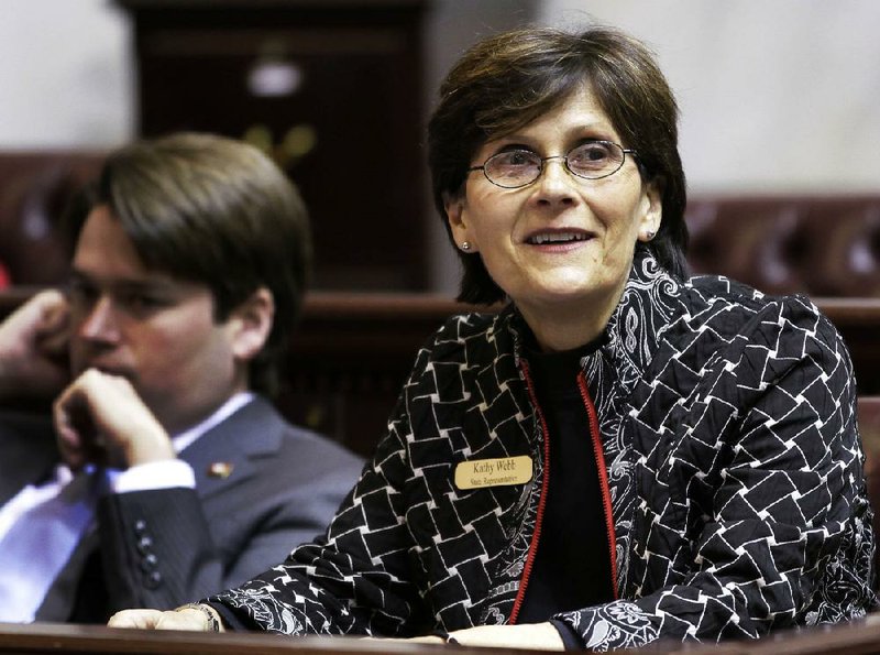 Rep. Kathy Webb of Little Rock watches the vote Tuesday on the General Appropriation Bill along with Rep. Duncan Baird of Lowell. 