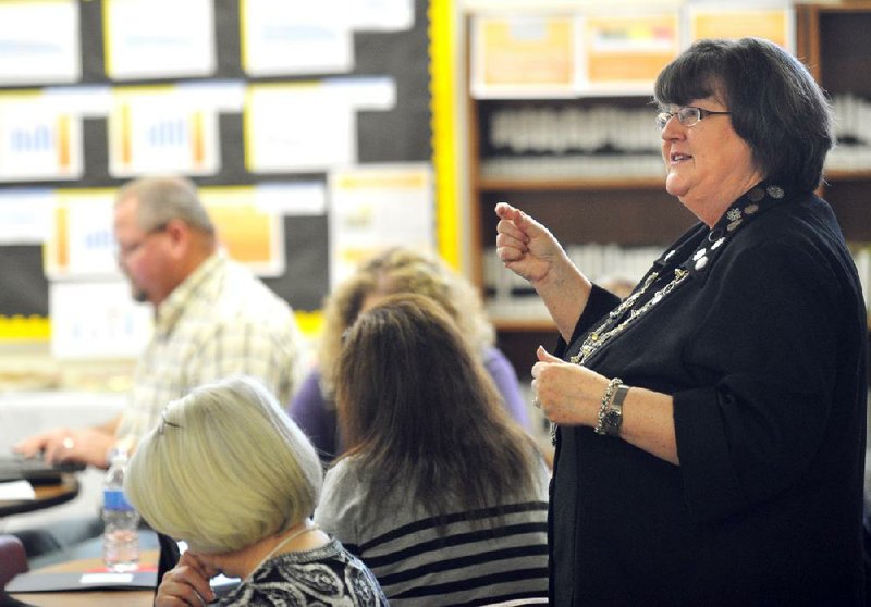 Arkansas Democrat-Gazette/MICHAEL WOODS --02/16/2012-- Barbara Hunter Cox, Director of Teaching and Learning with the Arkansas Public School Resource Center, speaks to local teachers and administrators during the first training meeting Thursday afternoon in Prairie Grove for Northwest Arkansas districts involved in the Achieving By Changing project of the Arkansas Public School Resource Center. There are five or six rural districts and one charter school involved with this program, which is designed to help them with implementing the new Common Core State Standards.