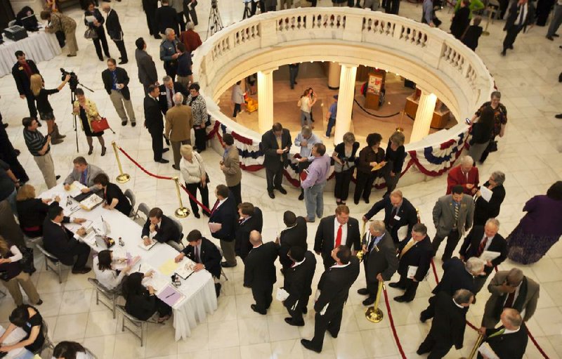 Candidates line up to file to run for political office at the Arkansas state Capitol in Little Rock, Ark., Thursday, Feb. 23, 2012, the first day of the seven-day filing period. (AP Photo/Danny Johnston)