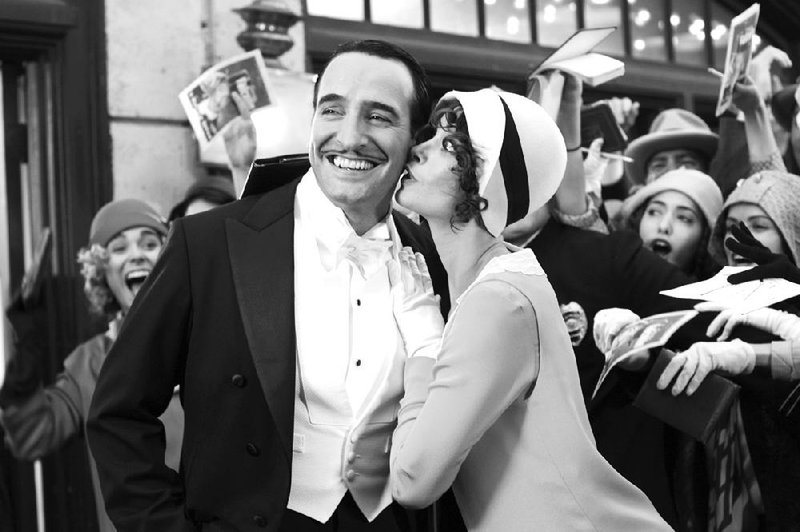 Silent film star George Valentin (Jean Dujardin) meets the vivacious Peppy Miller (Berenice Bejo) in The Artist, the movie considered the favorite for this year’s Best Picture Oscar. 