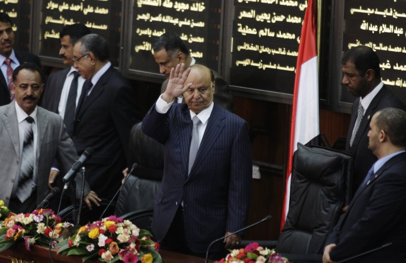 Yemen's newly elected President Abed Rabbu Mansour Hadi waves as he arrives to the Parliament in Sanaa, Yemen, Saturday, Feb. 25, 2012. Hadi took the oath of office before the country's parliament Saturday. He replaces Ali Abdullah Saleh, who ruled the country for 33 years before leaving office in a power transfer deal aimed at ending more than a year of political turmoil.