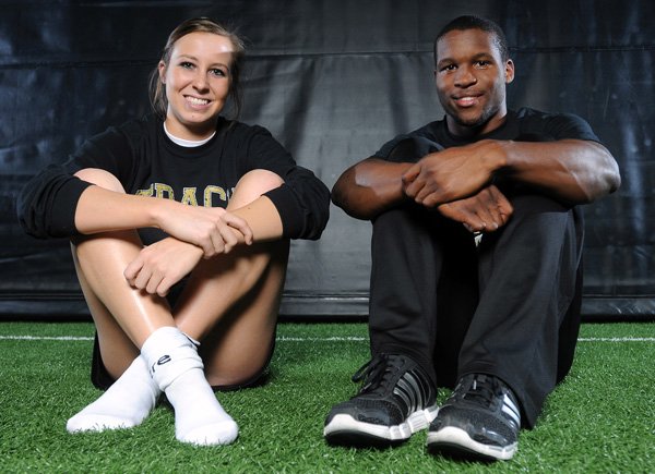 Bentonville triple jumpers Brittani Reagan, left, and DeMarcus Murphy are going to New York City to compete at the New Balance Indoor Nationals in the Armory Track and Field Center. Murphy is scheduled to compete at 9 a.m. Sunday, while Reagan gets her turn at noon.