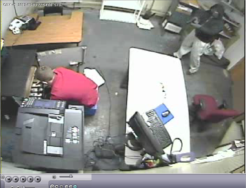 Surveillance footage from Sav-A-Lot grocery store robbery.