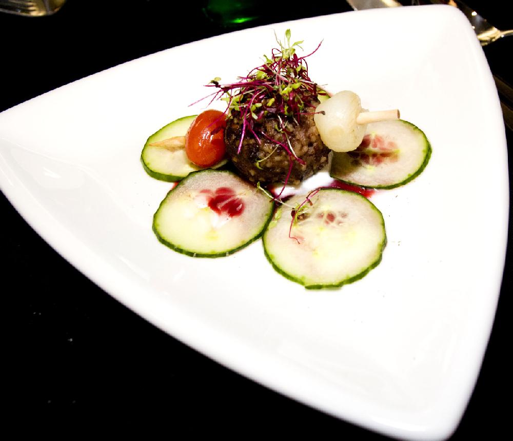Arkansas Democrat-Gazette/CARY JENKINS
Mediterrenean-style Kibeh Kabob with Deconstructed Blood Orange Tzatziki was served as the appetizer