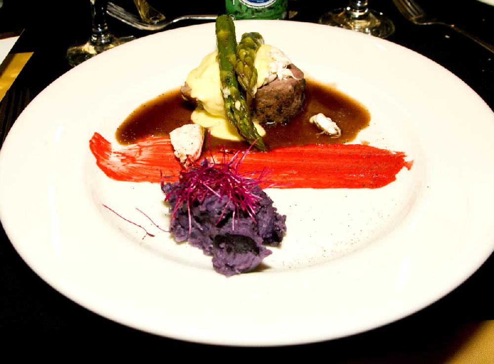 Arkansas Democrat-Gazette/CARY JENKINS
The evening's entree was whole beef tenderloin sliced into medallions, with asparagus spears and lump crab topped with Hollandaise Sauce and served with purple potatoes