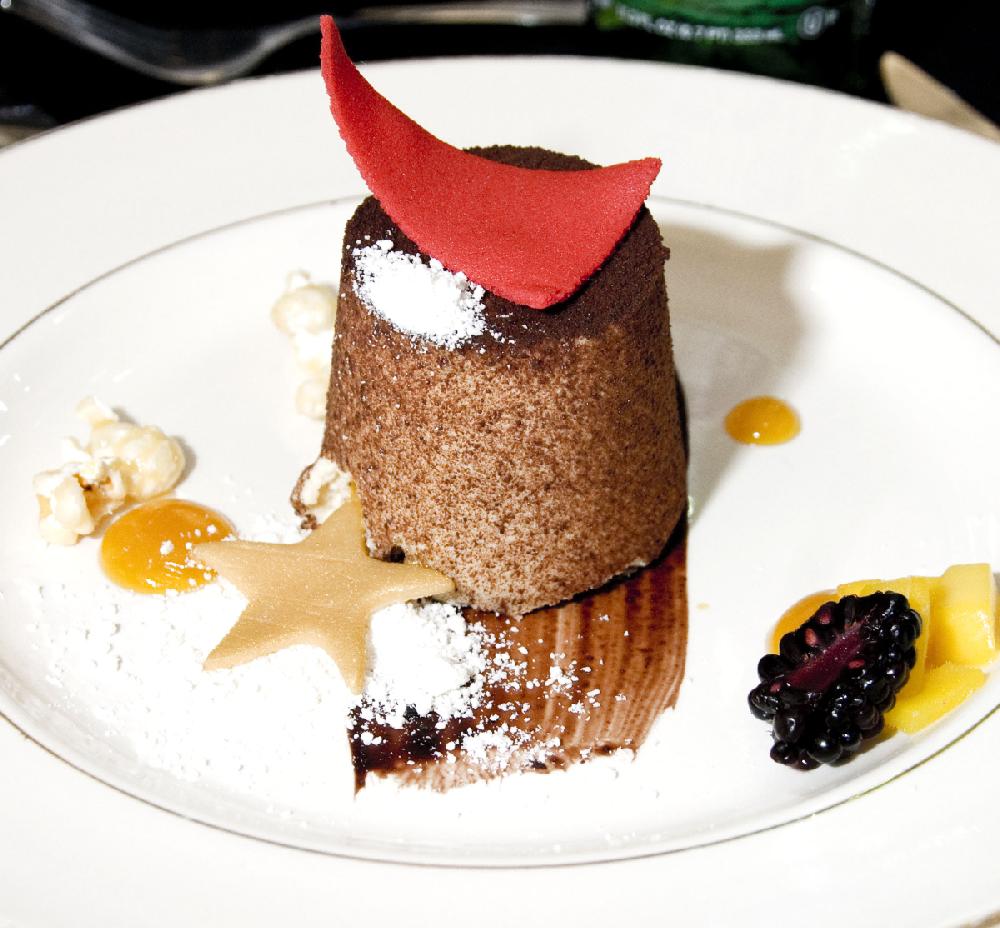 Arkansas Democrat-Gazette/CARY JENKINS
For dessert, guests were served a chocolate and caramel bouchon with candied popcorn