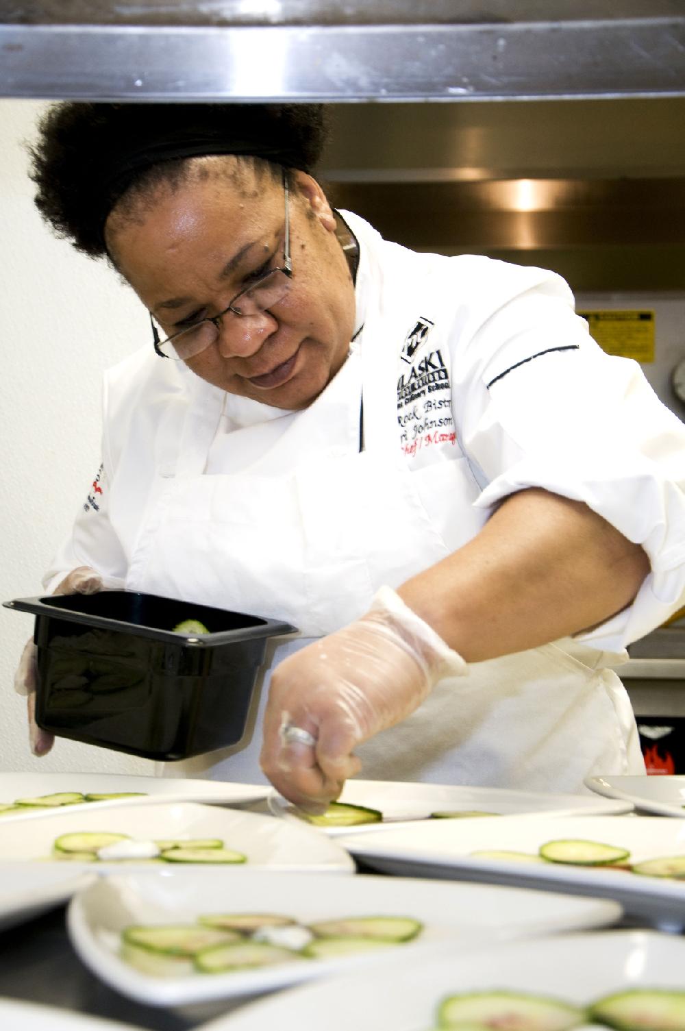 Arkansas Democrat-Gazette/CARY JENKINS
Chef Terri Johns prepares the evenings appetizers. During the dinner she was named Sous Chef of the Year.