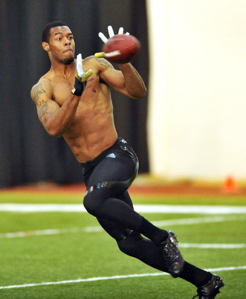 WholeHogSports - 4 former Hogs at Combine