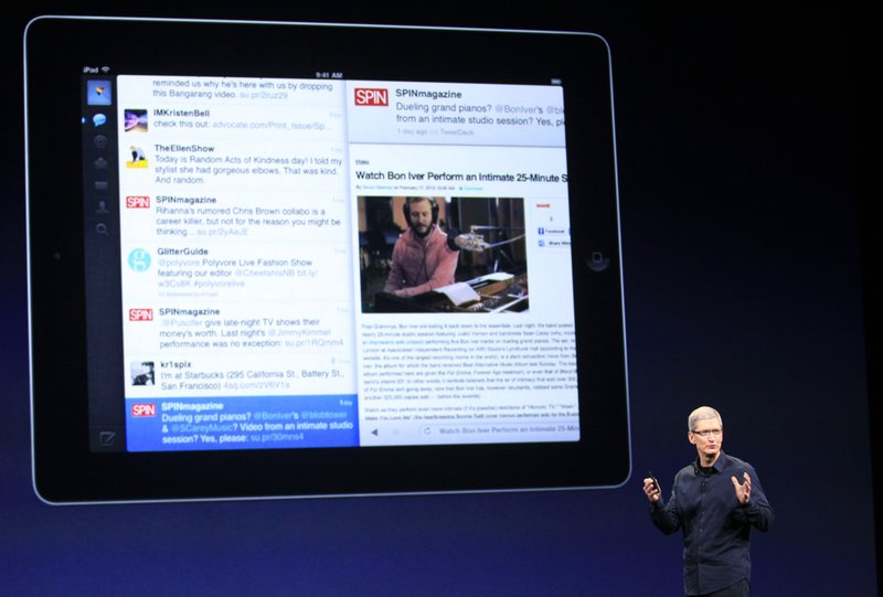 Apple CEO Tim Cook introduces the new iPad during an event in San Francisco, Wednesday, March 7, 2012. The new iPad features a sharper screen and a faster processor.