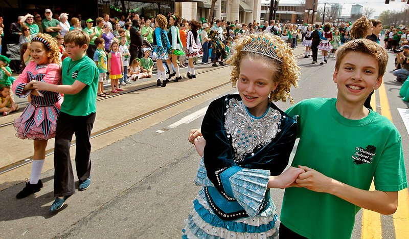 Children dance during the St. Patrick's Day parade in Little Rock and North Little Rock Saturday. The Irish Cultural Society of Arkansas hosted the parade. 