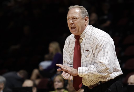 Arkansas coach Tom Collen encourages his team during the first half of an NCAA tournament first-round college basketball game against the Dayton, Saturday, March 17, 2012, in College Station, Texas. (AP Photo/David J. Phillip)