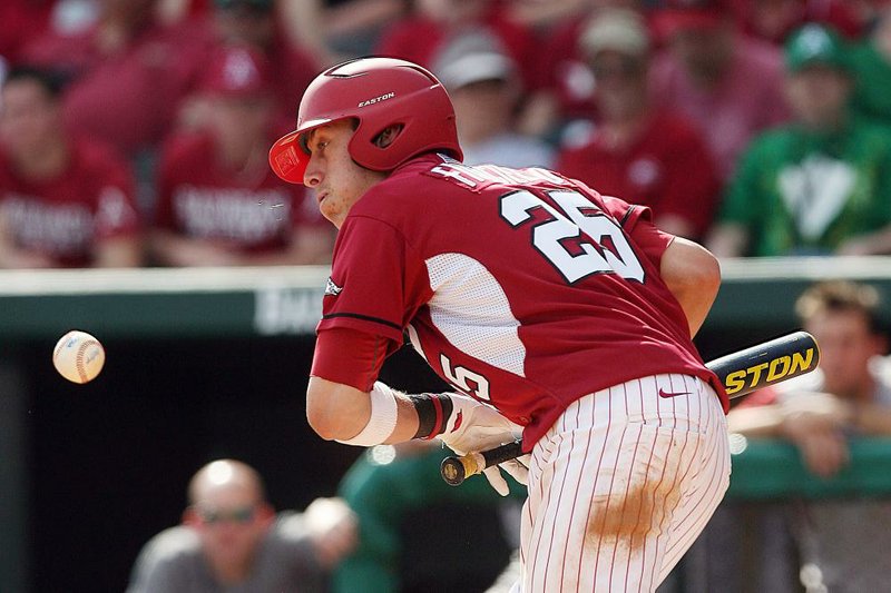 The Razorbacks scored five runs in the 11th inning and defeated Mississippi State 8-5 Sunday before 2,572 fans at Dudy Noble Field in Starkville, Mississippi. Arkansas' Dominic Ficociello, shown above, made several important plays. 