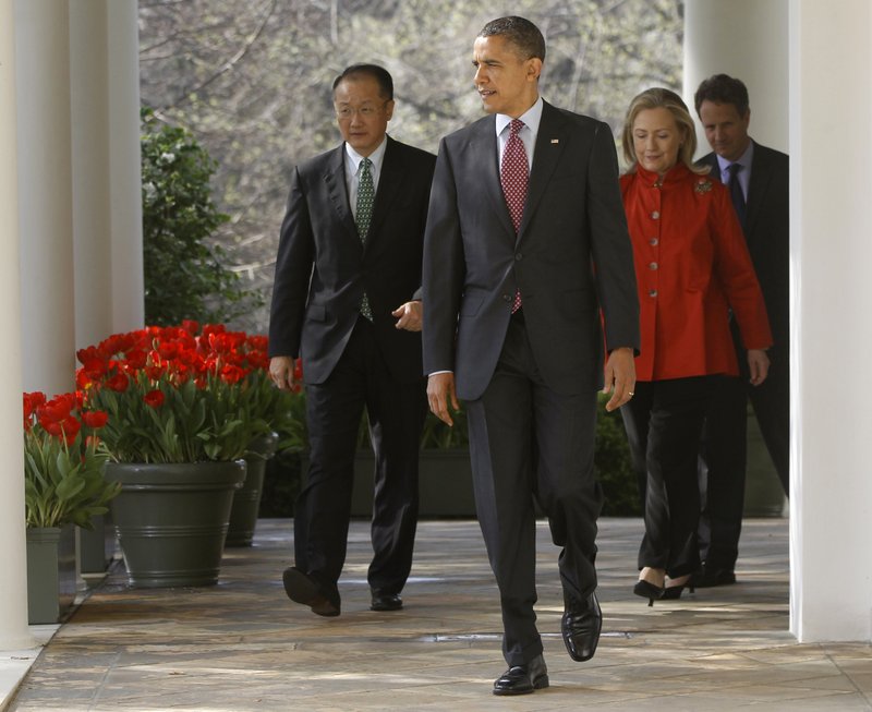 President Barack Obama walks with Jim Yong Kim, his nominee to be the next World Bank President, Secretary of State Hillary Rodham Clinton, and Treasury Secretary Timothy Geithner to the Rose Garden of the White House in Washington, on Friday, March 23, 2012.