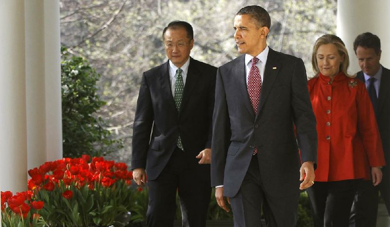 President Barack Obama walks with Jim Yong Kim, his nominee for president of the World Bank, and Secretary of State Hillary Rodham Clinton for a news conference Friday at the White House. 