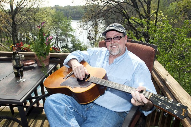 Mark Abernathy is in his favorite space, the deck at his North Little Rock home.