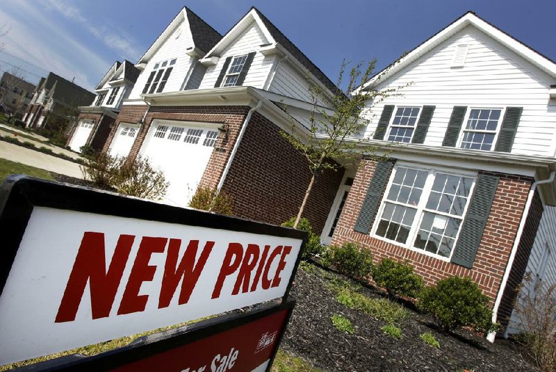 Newly built houses sit for sale earlier this week in Pepper Pike, Ohio. New-home sales represent less than 10 percent of the housing market, according to the National Association of Home Builders.