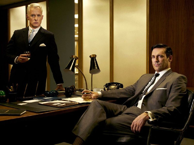Special to the Democrat-Gazette
John Slattery plays Roger Sterling and Jon Hamm plays Don Draper on the 
AMC series Mad Men, set in the Manhattan world of 1960s advertising.
