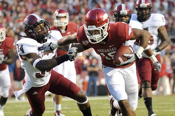 Arkansas’ Javontee Herndon (right) caught only two passes his freshman year, but added eight more in his sophomore season for a two-year yardage total of 169. 
