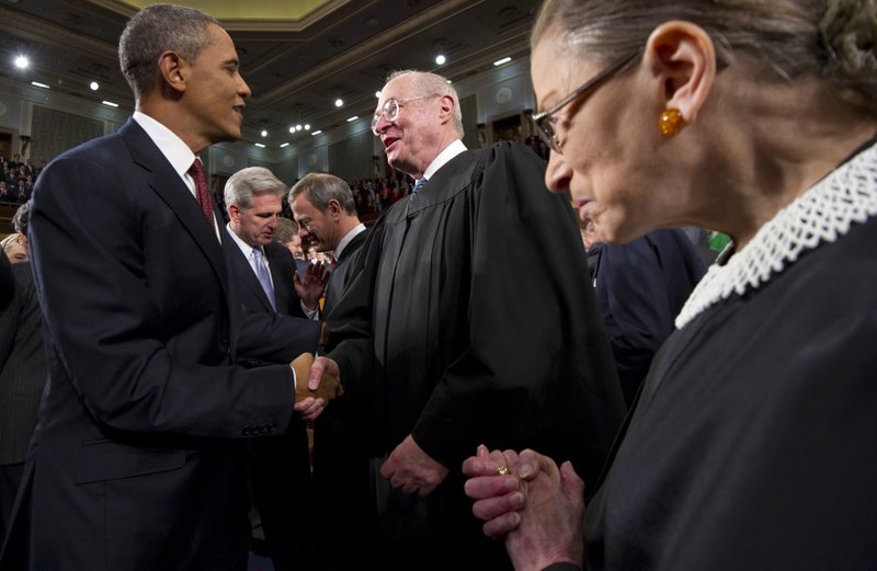In this Jan. 24, 2012, file photo President Barack Obama greets Supreme Court Justice Anthony Kennedy and Ruth Bader Ginsburg, right, prior to his State of the Union address in front of a joint session of Congress at the Capitol in Washington. The monumental fight over a health care law that touches all Americans and divides them sharply comes before the Supreme Court Monday, March 26, 2012. 