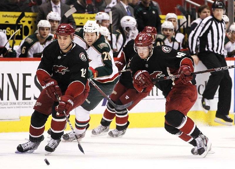 Phoenix Coyotes’ Paul Bissonnette (left) was the subject of a prank that had him searching for his underwear after a practice last week. 