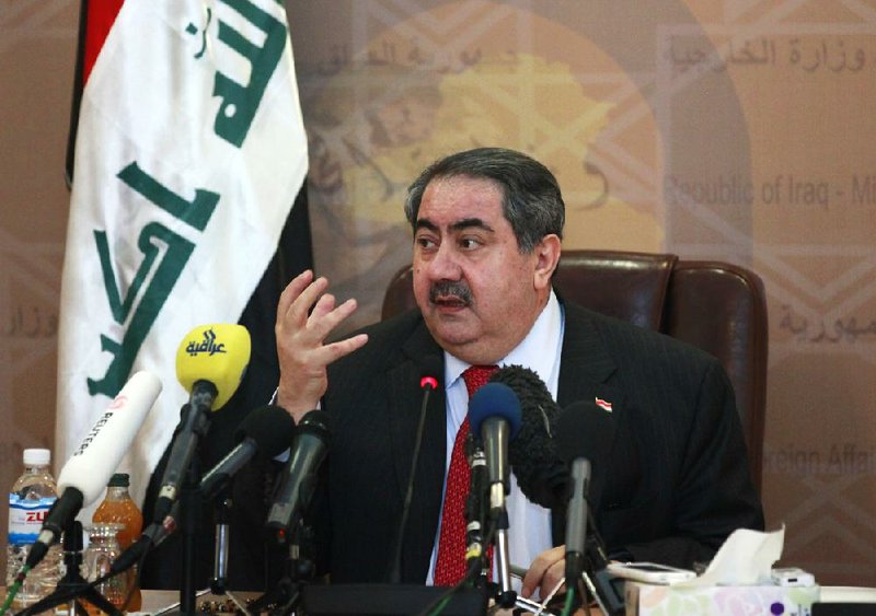 Iraqi Foreign Affairs Minister Hoshyar Zebari speaks during a news conference Monday in Baghdad, where an Arab League summit set to open today will focus primarily on Syria. 