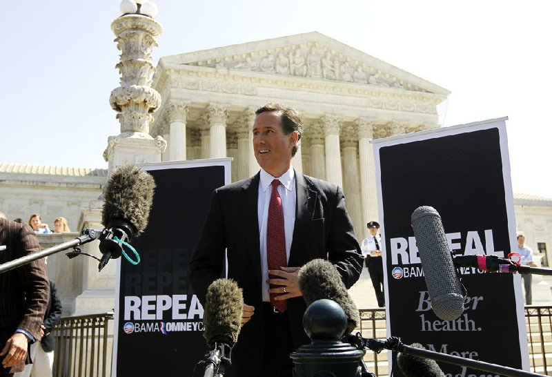 Republican presidential candidate Rick Santorum speaks in the front of the Supreme Court on Monday in Washington. 