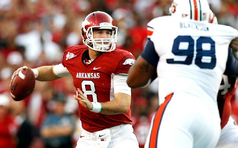 
Arkansas quarterback Tyler Wilson looks for a target during the first quarter against Auburn at Donald W. Reynolds Razorback Stadium in Fayetteville on Saturday, Oct. 8, 2011.