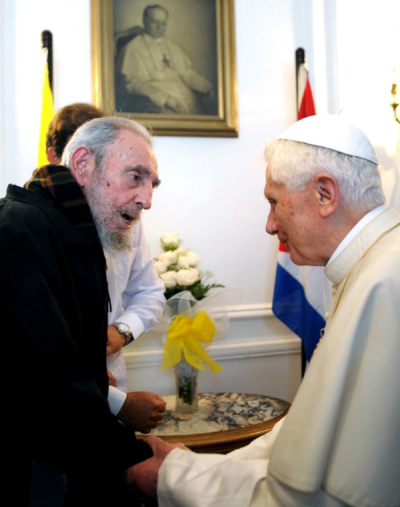 Osservatore Romano Pope Benedict XVI, right,  meets with Cuban leader Fidel Castro in Havana, Wednesday.