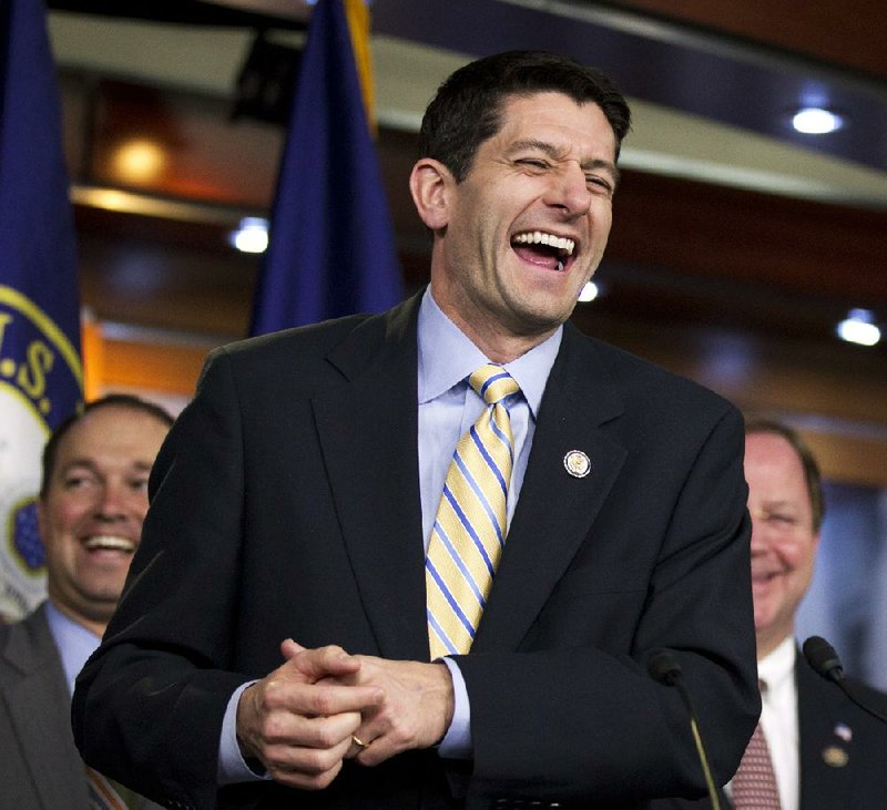 House Budget Committee Chairman Rep. Paul Ryan laughs during a news conference Thursday. 