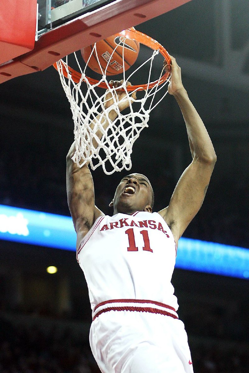 Arkansas Democrat-Gazette/WILLIAM MOORE
Arkansas' BJ Young misses a dunk against Florida Saturday, February 18, 2012 at Bud Walton Arena in Fayetteville.