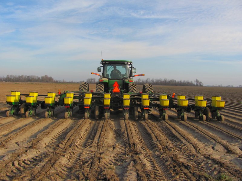 A farmer plants corn in Chicot County in February. 