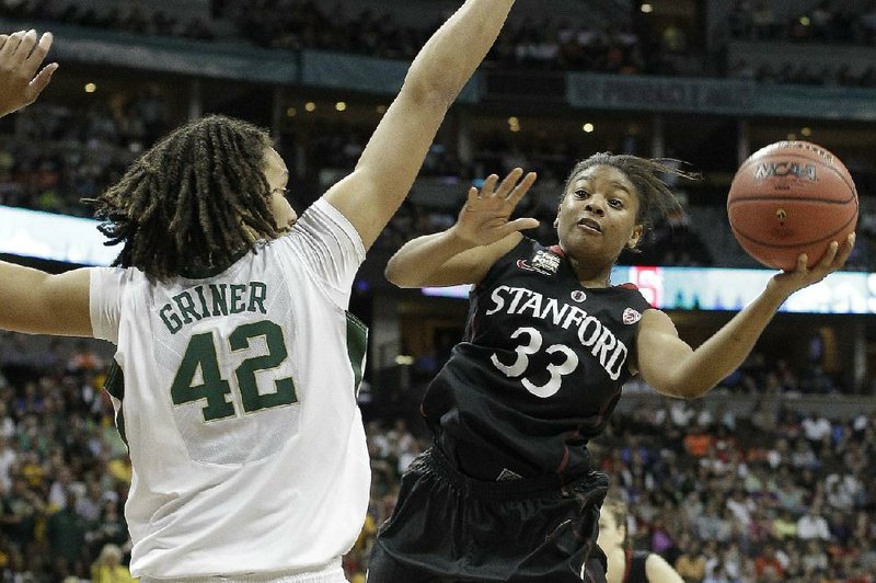 Baylor center Brittney Griner (left) defends Stanford guard Amber Orrange during the second half of the Bears’ 59-47 victory on Sunday night at the Pepsi Center in Denver. 