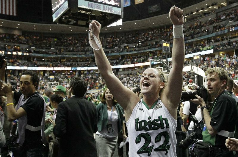 Notre Dame guard Brittany Mallory celebrates after the Irish beat Connecticut 83-75 in overtime on Sunday in Denver. 