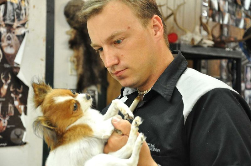 FILE — Daniel Ross’ taxidermy shop in Romance was the setting for Animal Planet’s American Stuffers. Here Ross works on a freeze-dried Chihuahua to make it even more lifelike. 