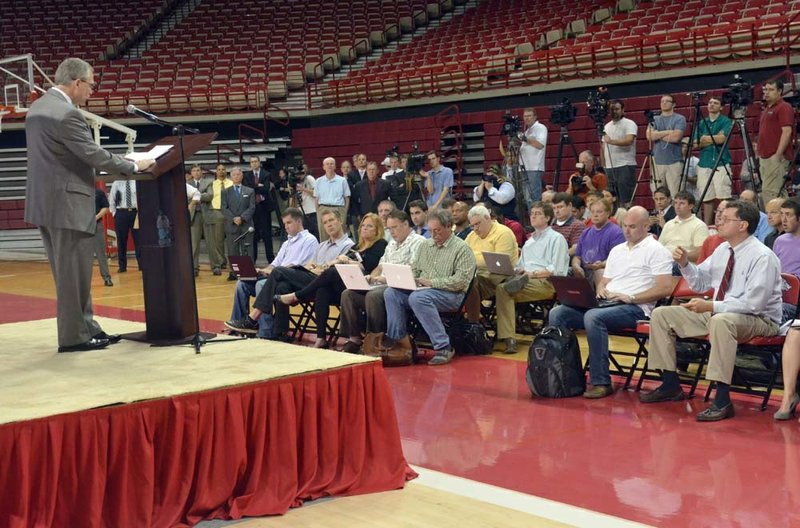 University of Arkansas Athletic Director Jeff Long address the media following the announcement of the firing of football coach Bobby Petrino Tuesday evening at Bud Walton arena in Fayetteville.