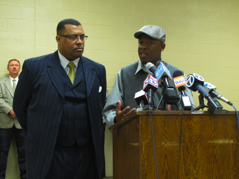 Tawana Blunt's brother, Calvin Blunt, right, speaks during a news conference Wednesday in Forrest City. At left is city police chief E.P. Reynolds.