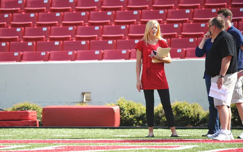 Eight months after resigning her position on the Arkansas football staff, Jessica Dorrell has landed a new job after moving to South Carolina. She is shown here at Reynolds Razorback Stadium in March.