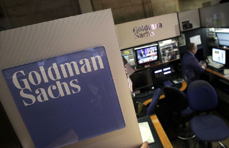 A trader works in the Goldman Sachs booth on the floor of the New York Stock Exchange in this file photo. 