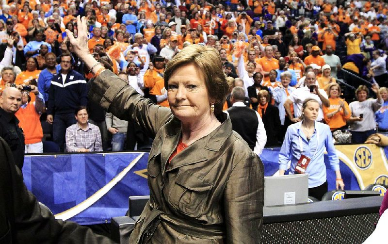 FILE - In this March 4, 2012, file photo, Tennessee head coach Pat Summitt waves to the fans after Tennessee defeated LSU 70-58 in the championship game at the women's Southeastern Conference tournament in Nashville, Tenn. Summitt, the sport's winningest coach, is stepping aside as Tennessee's women's basketball coach and taking the title of "head coach emeritus", the university announced Wednesday, April 18, 2012. Long-time assistant Holly Warlick has been named as Summitt's successor.  (AP Photo/Mark Humphrey, File)