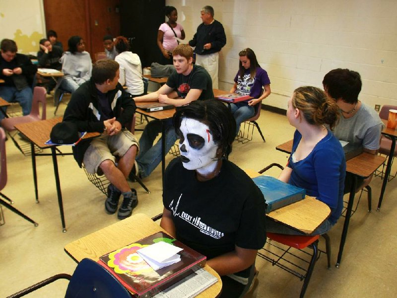 Trai’ona Reed sits silently Thursday in her North Pulaski High School class. Reed was one of 16 “walking dead” volunteers representing teens killed in drunken driving accidents. 