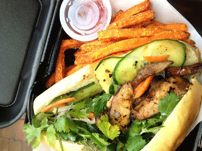 The Banh Mi ($7) is served by Haute Wheels at the first Food Truck Friday event on Main Street. 