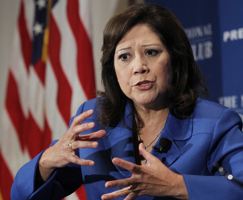 In this Aug. 30, 2011 file photo, Labor Secretary Hilda Solis speaks at the National Press Club in Washington. An aging population and an economy that has been slow to rebound are straining the long-term finances of Social Security and Medicare, the government's two largest benefit programs. Those problems are getting new attention Monday as the trustees who oversee the massive programs release their annual financial reports.