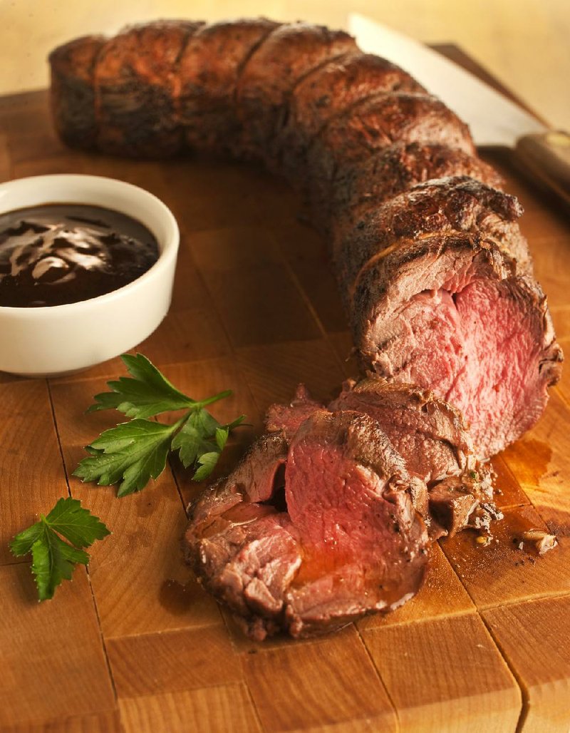 Buying farm-raised venison like this roasted tenderloin is one option for taming the gaminess of deer meat, but it isn’t the only option. Many cooks swear by a method of soaking the meat in saltwater overnight, then in milk to draw out the gamy flavor. For a tender, flavorful tenderloin, tie the tenderloin to maintain shape and roast in a 300-degree oven to medium (125 degrees), then sear in a hot skillet to finish. Let rest 15 minutes before slicing and serving. 