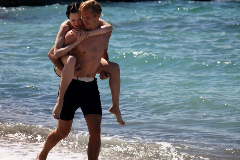 The Crown Prince of England (James D’Arcy) frolics with the “American divorcee” Wallis Simpson (Andrea Riseborough) in Madonna’s romantic bio-pic, W.E. 
